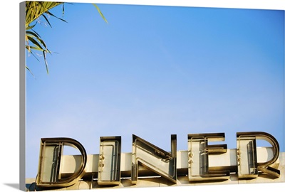 Low angle view of a commercial Diner sign