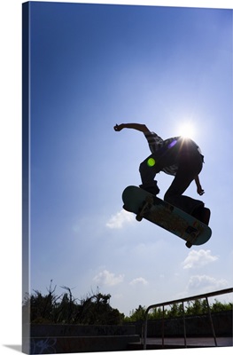 Low angle view of a kid skateboarding