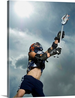 Low angle view of lacrosse player