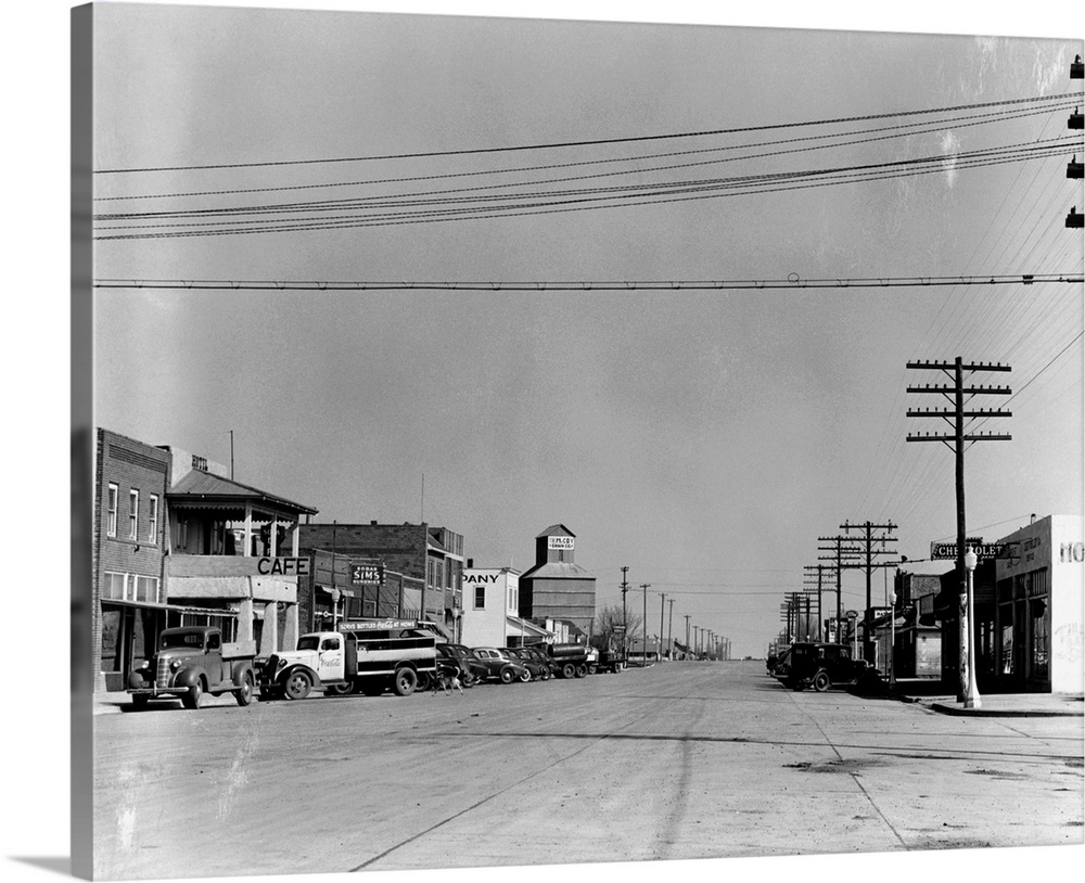 Sublette is the County Seat of Haskell County. This is the Main Street and Business Section. Notice that most of the cars ...