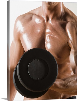 Male body builder flexing lifting weight