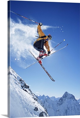 Male skier in mid-air