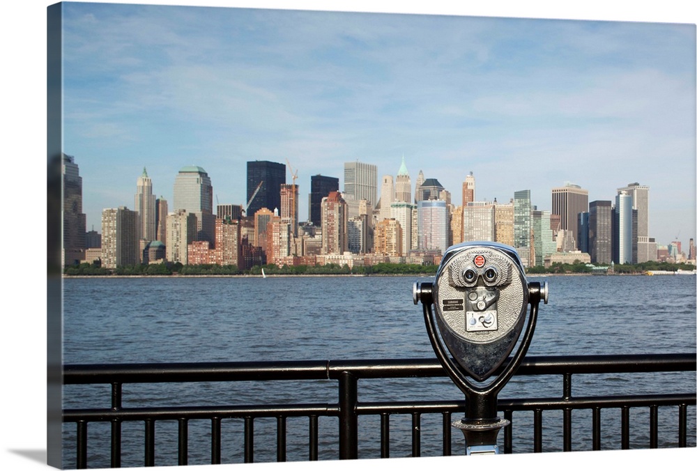 USA, New Jersey, Jersey City, Coin operated binoculars pointed at Manhattan skyline rises from viewpoint along Hudson Rive...