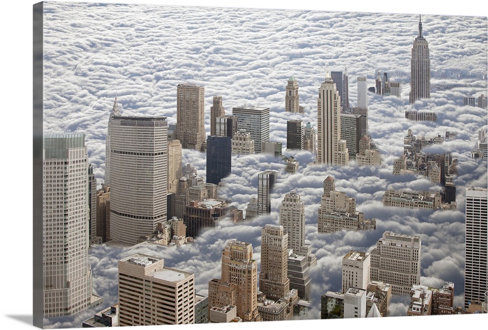 Aerial photograph looking down on Manhattan, New York that is sitting in heavy fog and all you can see are the high rise s...