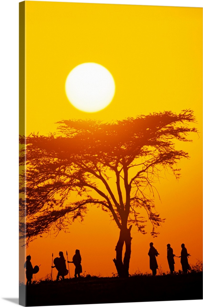 Masai tribe silhouetted at dawn, Kenya