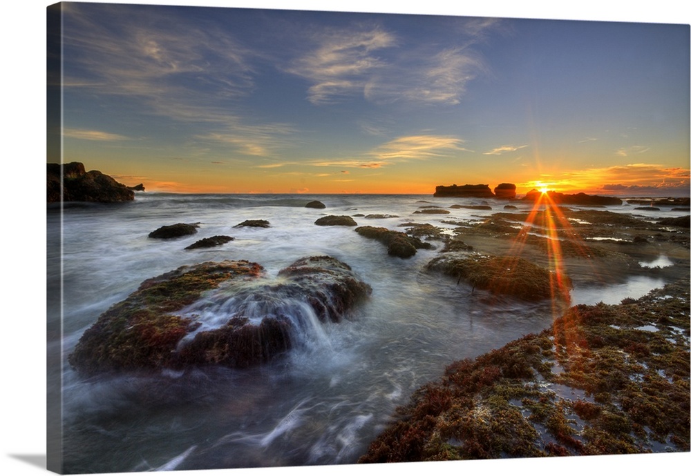 Sun flare at Mengening Beach, Bali