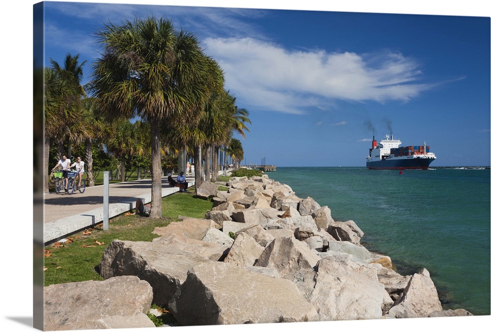 USA, Miami Beach, South Beach, beach walkway and cargo ship, South Pointe Park.