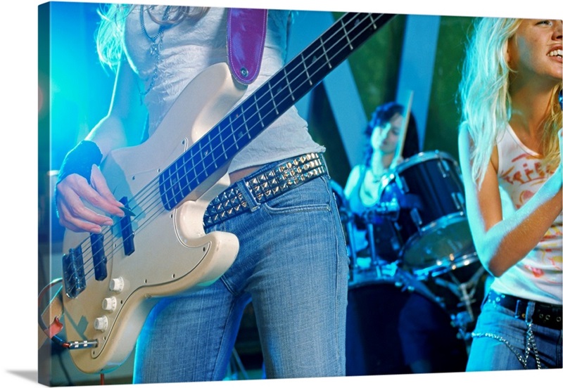 Mid section of a guitarist in a band Great Big Canvas