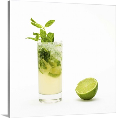 Mojito with fresh mint leaves and lime on crushed ice