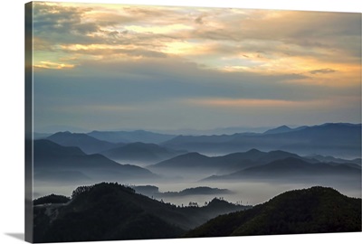 Morning Calm with montains in the fog