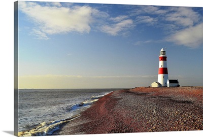 Morning light at Orford Ness Lighthouse with sea