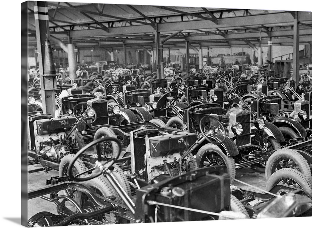 Many Morris Motors automobile chassis in the factory in Cowley wait for the bodies to be added.