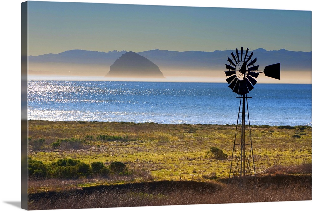 Windmill at Morro bay with mist at sunset.