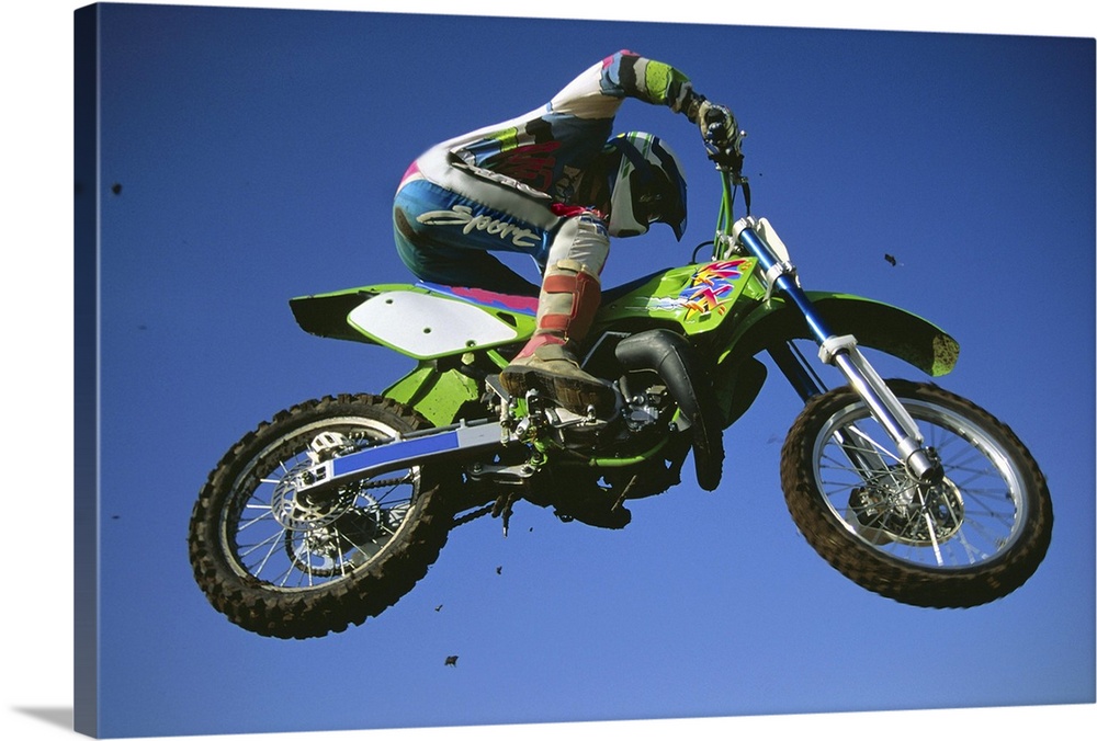 Motocross Bike & Rider Shot From Below As They Fly Though The Air