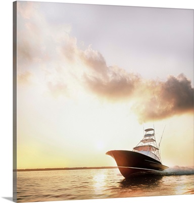 Motor yacht powering through calm water