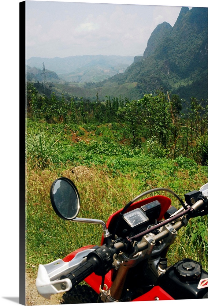 Adventure motorbike trip through mountains from Luang Prabang to Vang vieng, Laos, South East Asia.