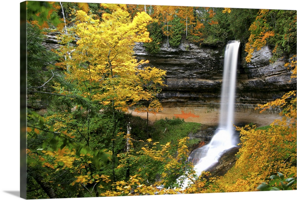 Munising Falls on a cloudy morning.  The colors had not quite peaked, so I &quot;helped&quot; nature by selectively decrea...