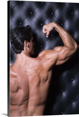 Muscular man flexing