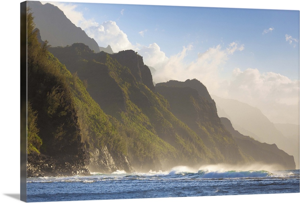 Ke'e beach on the island of Kauai with view along the Na Pali coast.