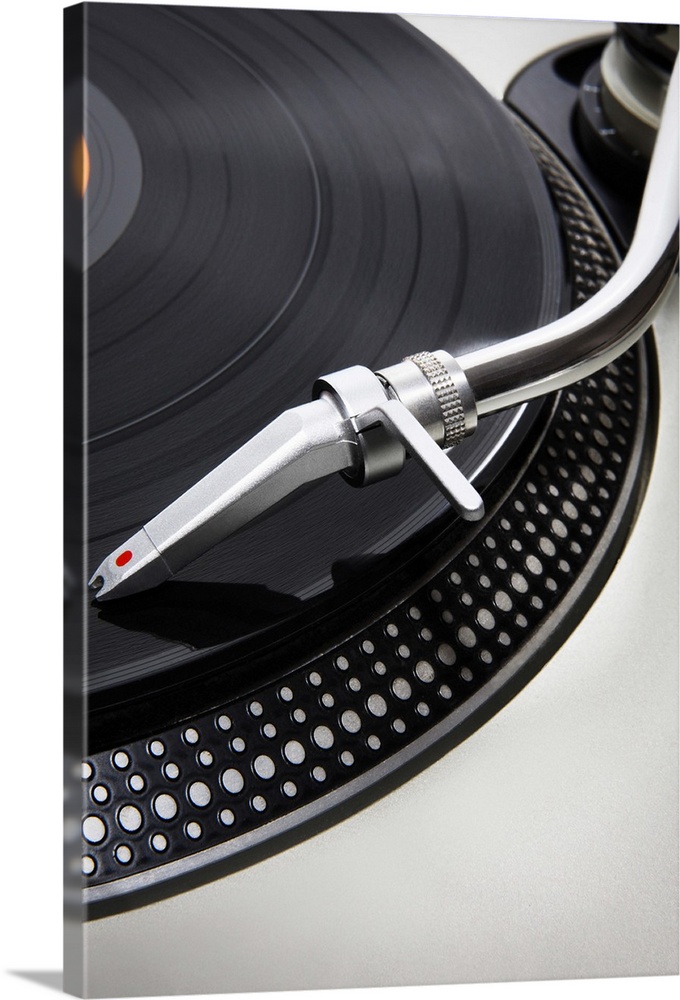 A Record needle stylus on a record deck playing a record