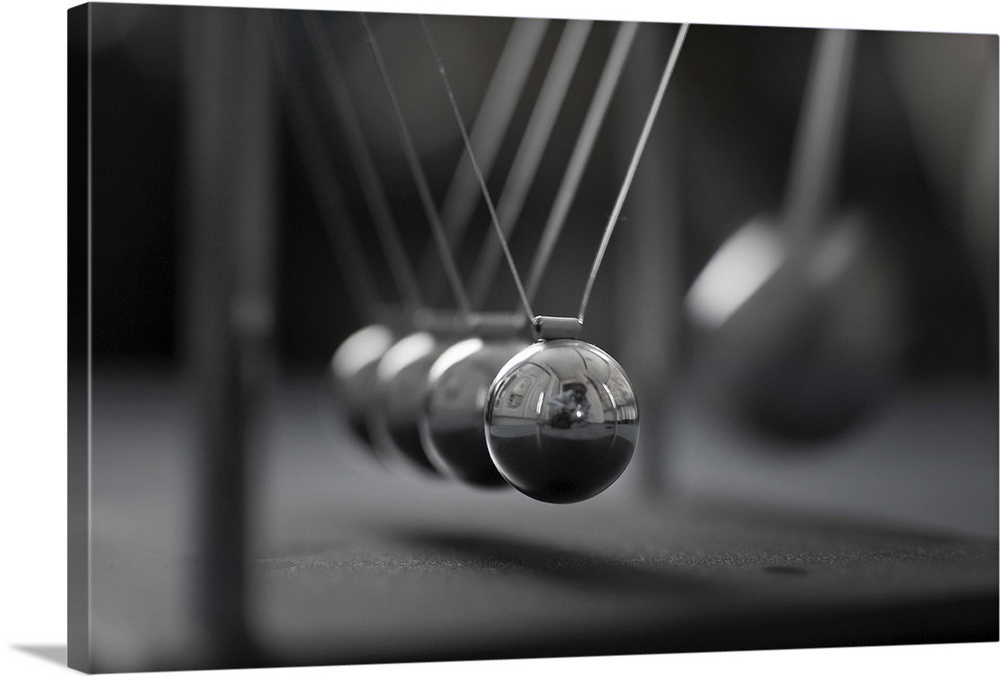 Newton's Cradle in Motion - Metallic Balls