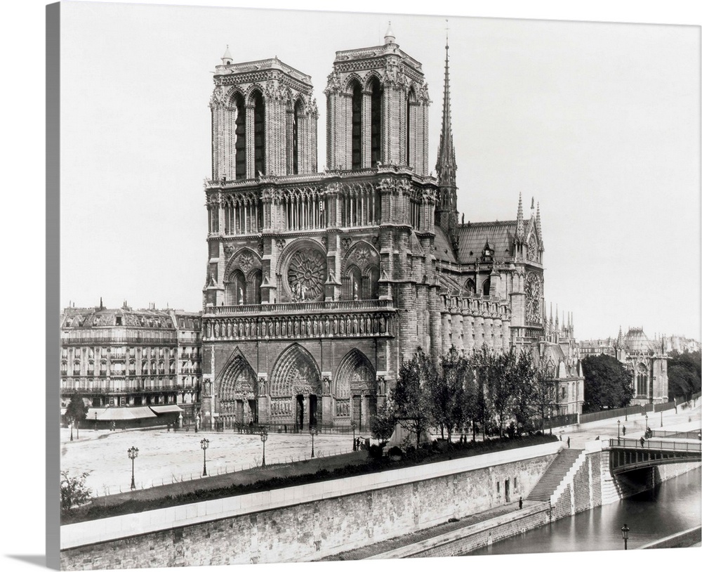 Paris, France: Side view of Notre Dame Cathedral from the opposite bank of the Seine. Undated photograph.