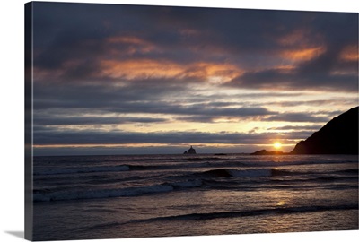 Ocean sunset silhouettes lighthouse, Oregon Coast