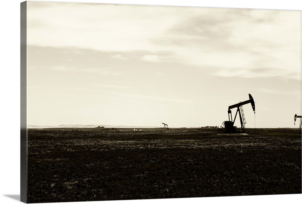 An oil pump, sepia toned in a field.