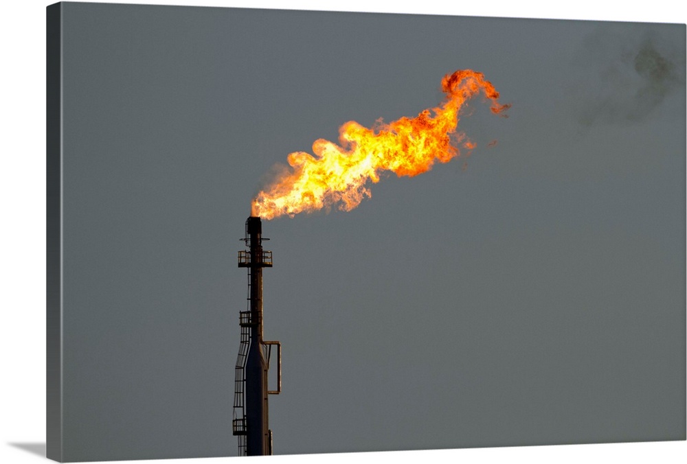 Dutch Antilles, Aruba, Flames billow from natural gas flare at Valero Oil Refinery | Location: San Nicholas, Aruba.