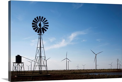 Old ranch windmill and water pump  at Wildorado Wind Farm, TX