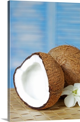 Open coconut in a tropical setting