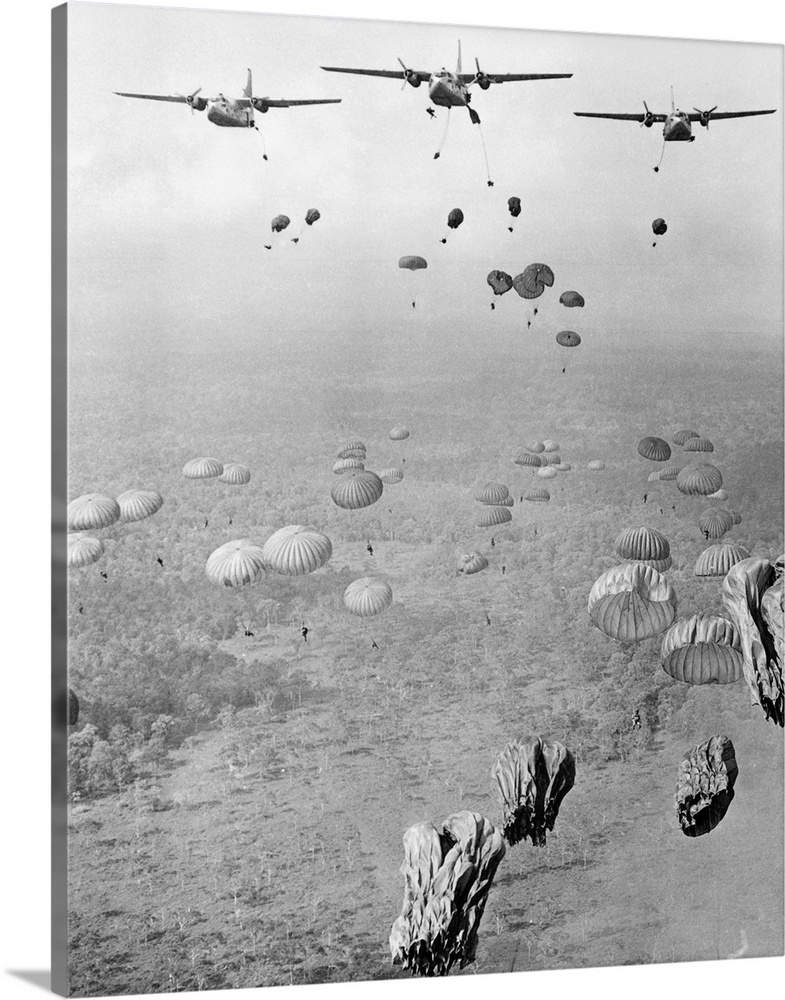 In two minutes, some 840 Vietnamese paratroopers are dropped from 16, US Air Force, C-123 transport planes in an attack on...