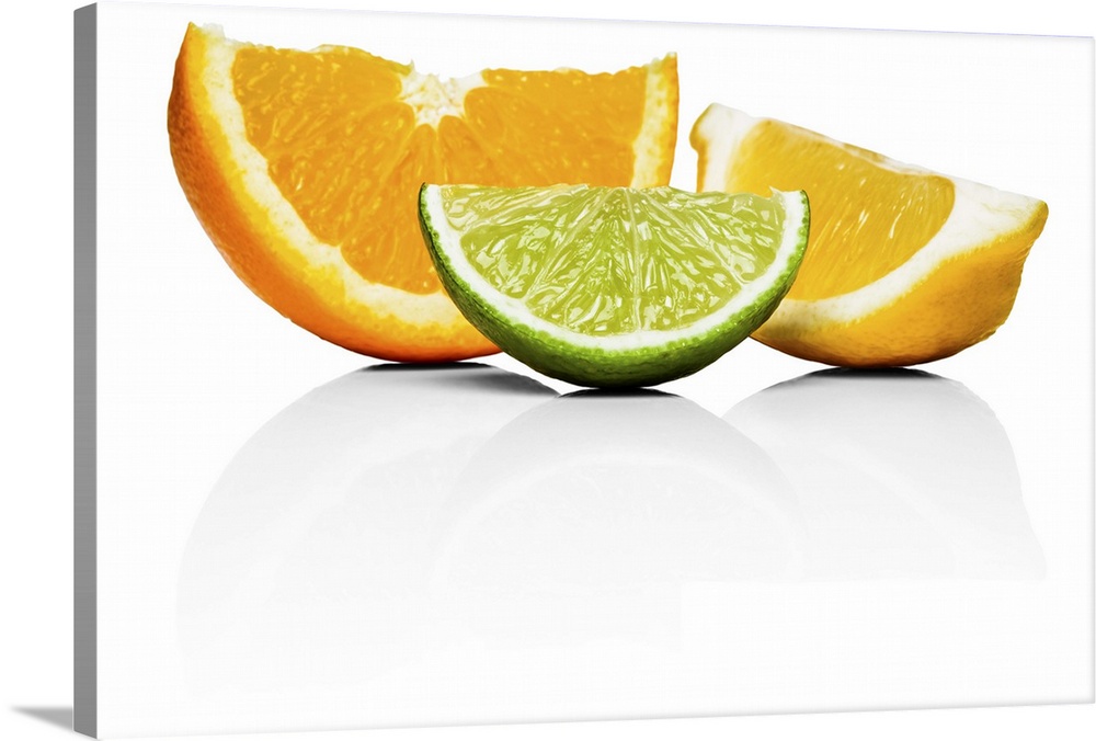 Orange, lime and lemon wedges, on white background, cut out