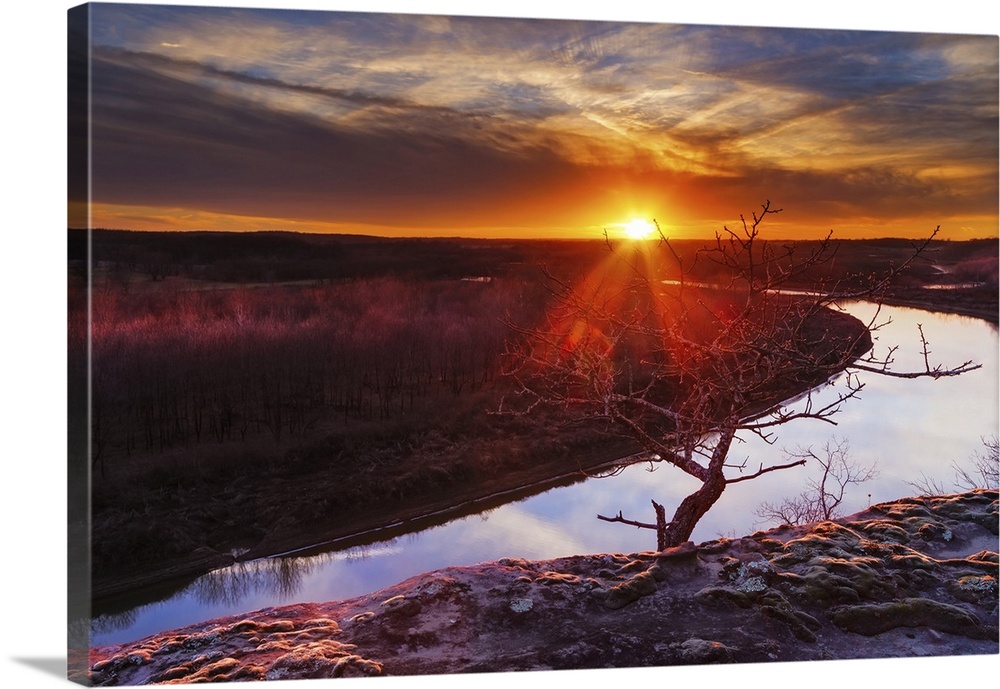 View from a bluff overlooking the Osage River during sunset with a colorful sunset.
