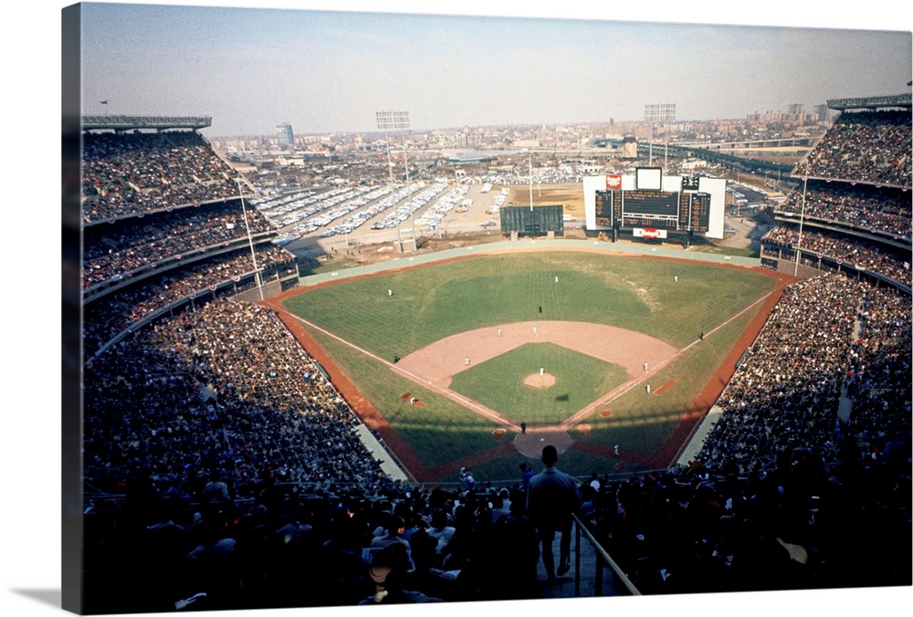 The opening day at Shea Stadium with crowd and field is shown.