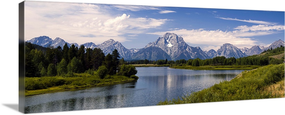 The Teton Range forms a dramatic backdrop in this famous viewpoint called the Oxbow Lake in Grand Teton National Park. On ...