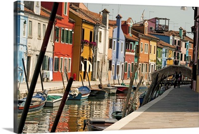 Painted houses with reflection in Burano