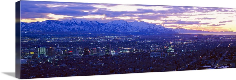 Panoramic sunset of Salt Lake City with snow capped Wasatch Mountains