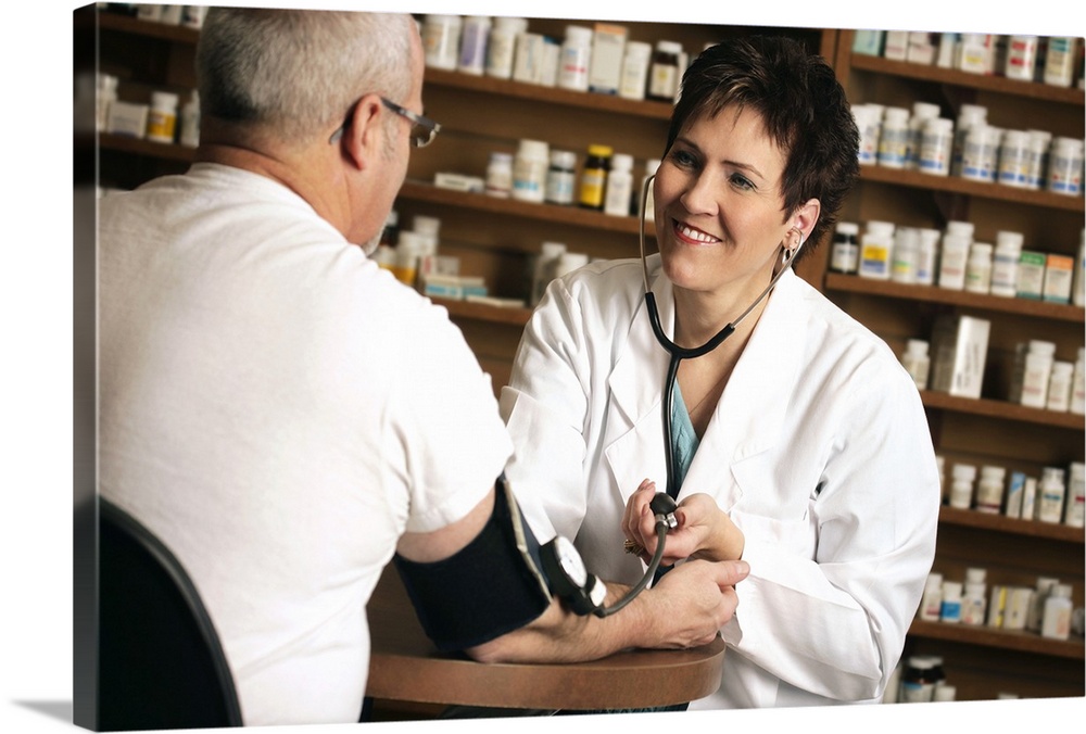 Pharmacist taking patient s blood pressure