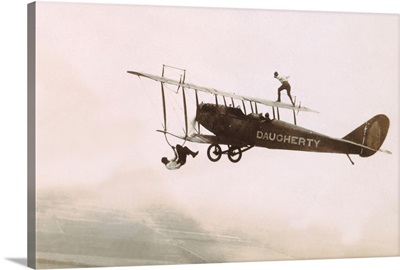 Photograph Of A Wingwalkers On A Biplane