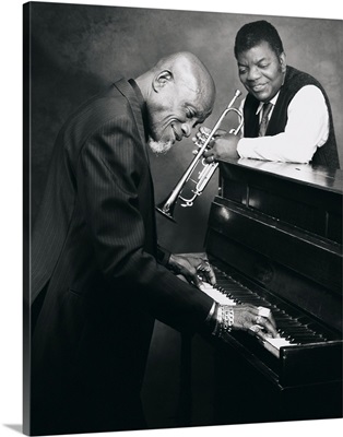 Pianist and trumpet player talking together