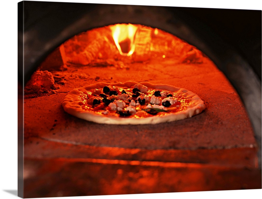 Pizza baking in the forno