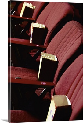 Popcorn bags in movie theater seats