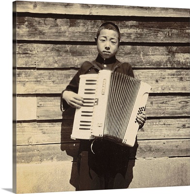 Portrait of a Japanese student playing Accordion
