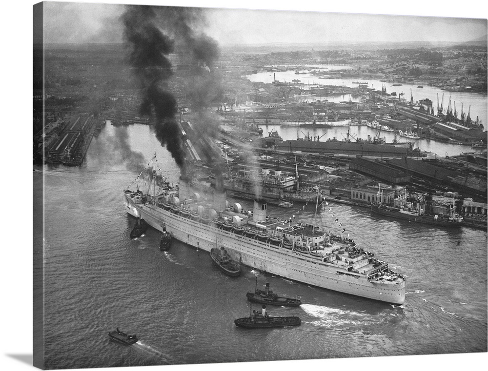 An Aerial View Of Southampton Docks Showing The Giant Cunarder Queen Mary Docking.
