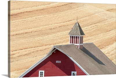 Red Barn In A Wheat Field
