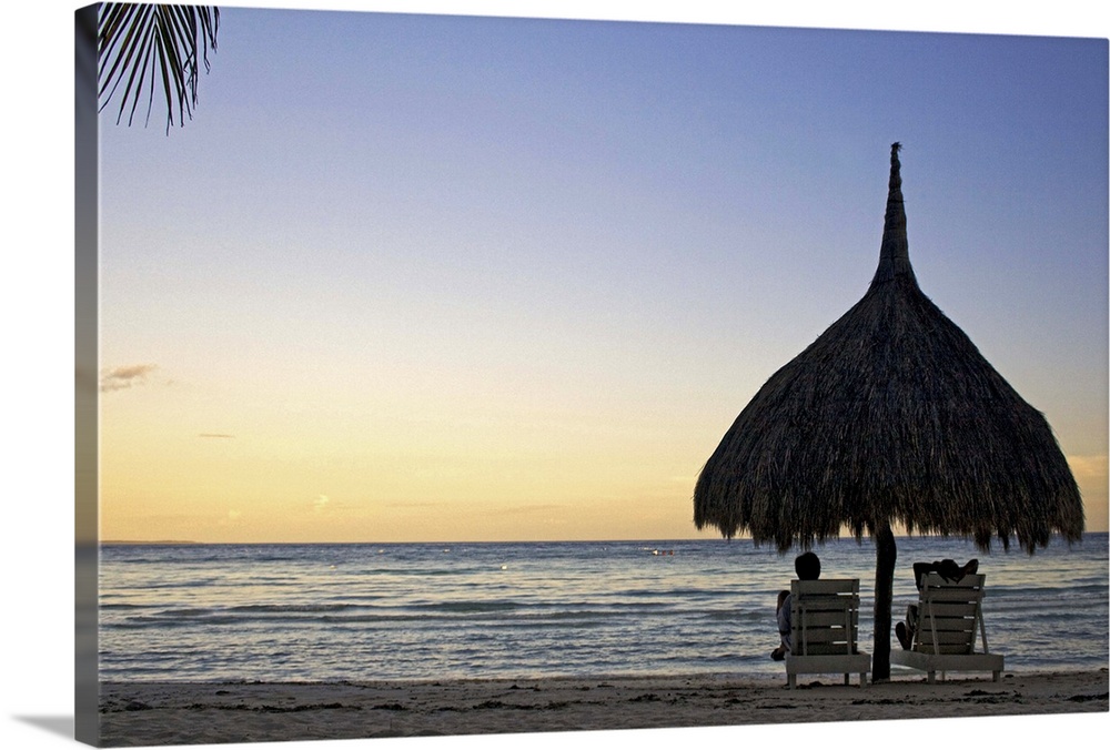 Relaxing as sun comes down at beach in Bohol,  Philippines.