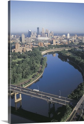 River in front of city skyline, Minneapolis, Minnesota