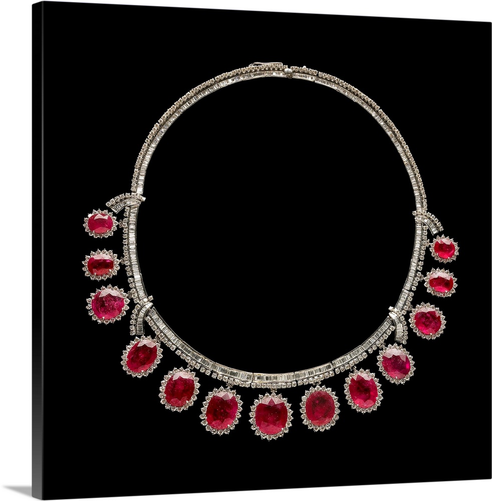 13 large Burmese rubies totaling 90 carats and hundreds of diamonds set in platinum. Early 20th century.