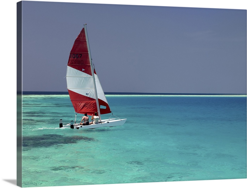 Sailboat on crystal blue water